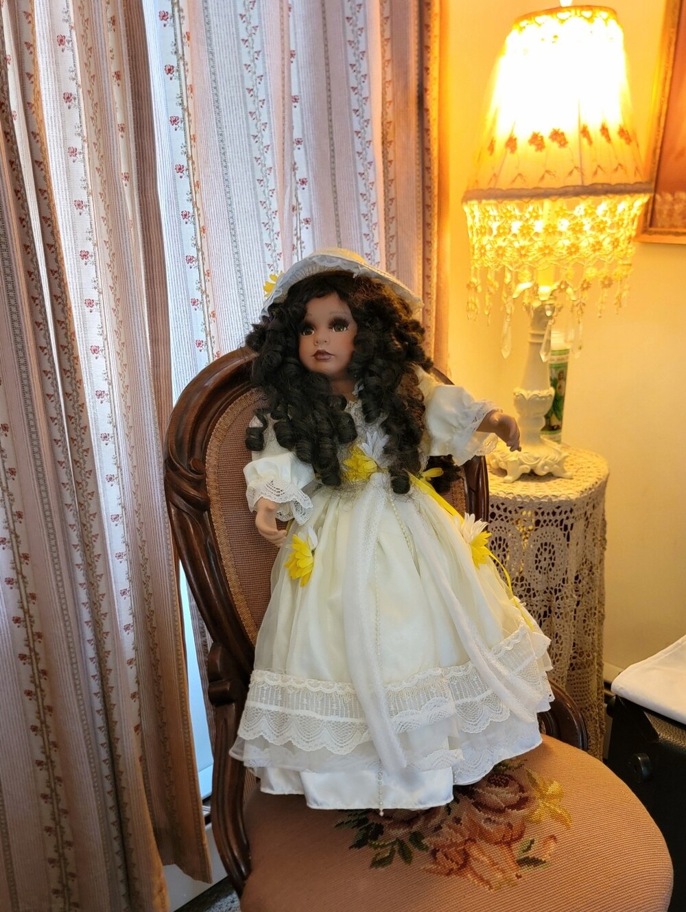 Beautiful Porcelain Girl Doll in White Dress with Yellow Accents.